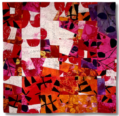 a painterly fabric quilt with an overriding grid that displays areas of bright red, white and pink accented with black graphic forms.