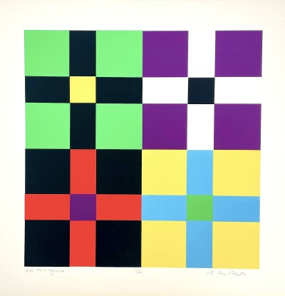 a square block design split into four fields with blocks of color from black, white to green, yellow, red that resembles a patchwork quilt.