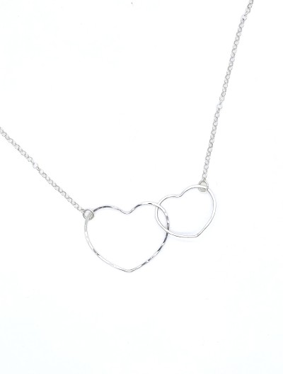a Sterling silver pendant in the shape of two interlocking hearts on a silver chain.