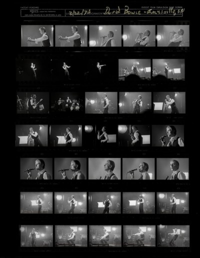 a black and white contact sheet of David Bowie in concert.