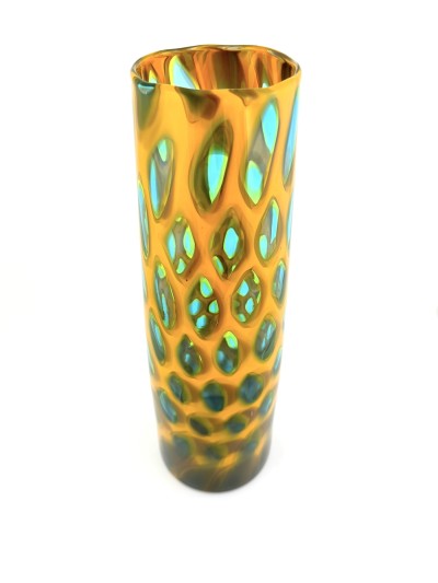 a tall narrow handblown glass conical shaped vase with a gold colored body and clear glass ovals outlined in turquoise titled 'Cone'.
