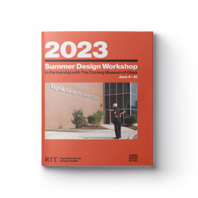 a red softcover book with title 2023 Summer Design Workshop