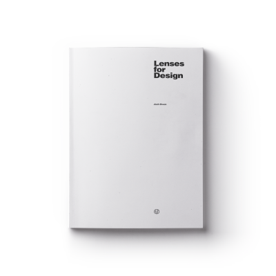 white hardcover book with title 'Lenses For Design' in black font.