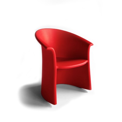 three quarter view of a bright red solid shaped rocking chair.