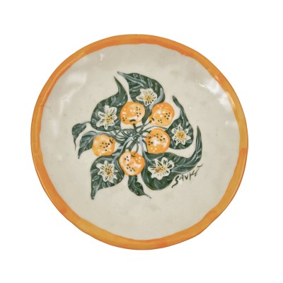 a hand-formed porcelain plate illustrated with bright orange clementines and green leaves