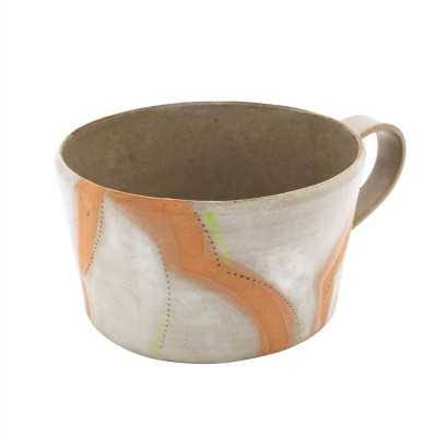 stoneware mug with stripes of orange and elements of green