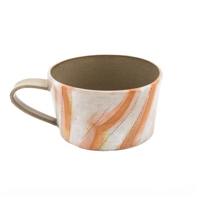 stoneware mug with bold orange stripes accented with cheerful yellow dots