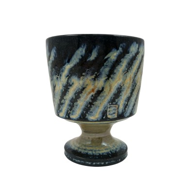 alternate view of a hand-thrown stemware cup with bright blue and tan stripes