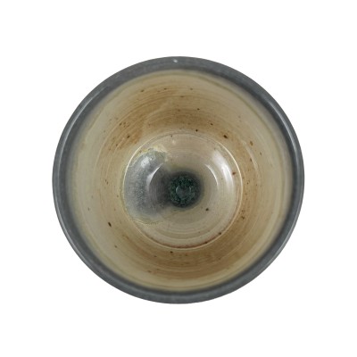 top of a hand-thrown stemware cup with a tan interior