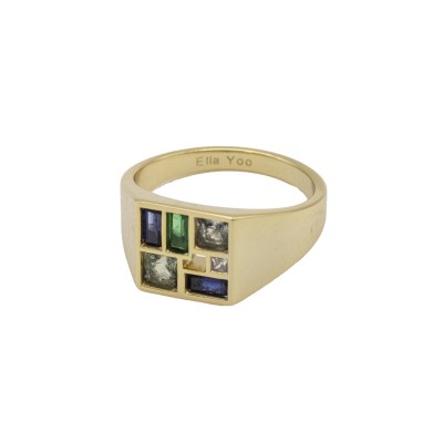 gold ring with geometrical shapes of blue, green, and aqua tone gemstones