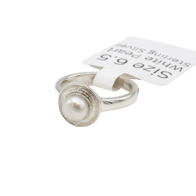 a sterling silver pearl halo ring