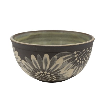a ceramic bowl with painted sunflowers