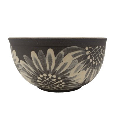 a ceramic bowl with painted sunflowers