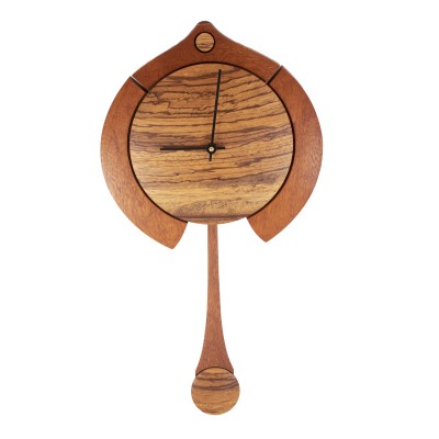 a beautiful pendulum clock made of mahogany and zebra wood