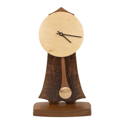 mantle clock that is made of walnut and ambrosia maple wood