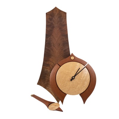 a stunning walnut, mahogany, and birdseye clock
