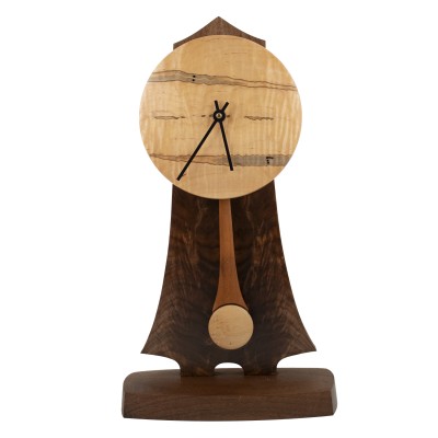 a tall mantle clock made from walnut and birseye wood