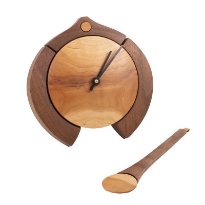 a beautiful walnut and cherry mini pendulum clock