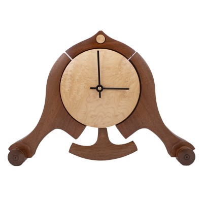 a gorgeous low mantle clock made of cherry and birdseye wood
