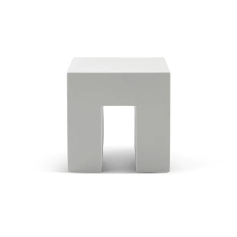 a streamlined, light grey plastic cube shaped side table with no adornment.
