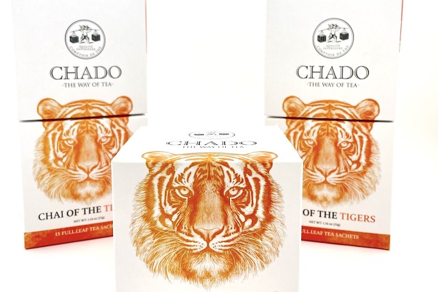 three square white boxes with an illustration of a tiger head and the words 'Chai of the Tiger' printed. 
