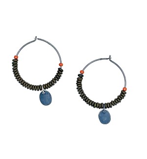 A pair of hoop earrings with black beads with one red bead on either side, at the center there is a small oval disk hanging down.