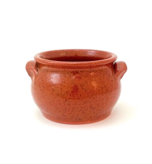 A redware crock with small handles on either side.