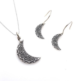 Sterling Silver Cresent Moon Pendant and Earring Set with mandala pattern stamped onto it.
