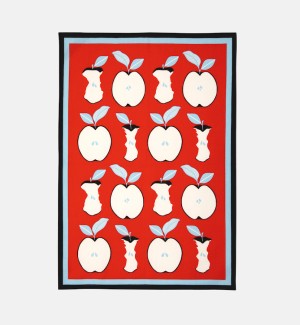 Tea towel with a red background and black and pale blue border, there are halved apples and apple cores arranged in columns.