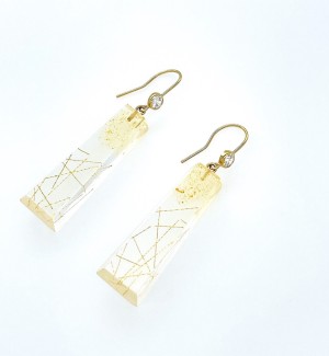 gold filled dangle earrings with Cubic Zirconia and gold filaments and metallic acrylic paint suspended in a long geometric Resin.