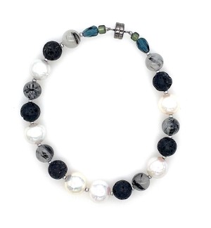 Bracelet made of a variety of lapis, pearl, and glass beads.