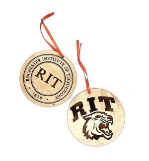 Two Laser cut wood Ornaments including one with the Rochester Institute of technology campus seal and one with the tiger mascot logo with the letters R I T above it, both on orange ribbon.