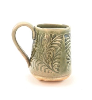 Handbuilt green and tan Ceramic Mug stamped with fern pattern.