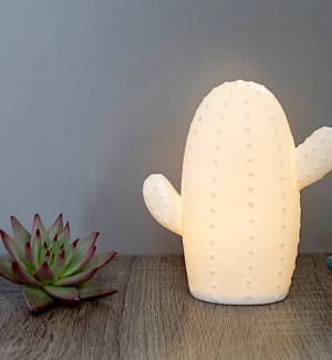 A porcelain lamp shaped like a cactus.