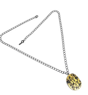 oxidized Sterling Silver chain and disk pendant with 23K Gold leaf on it.