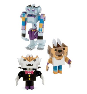 3D paper craft figures of a Frankenstein-like character, a Dracula-like character, and a werewolf-like character.