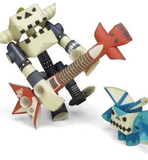 3D paper craft figures of a character holding a guitar and a little creature.