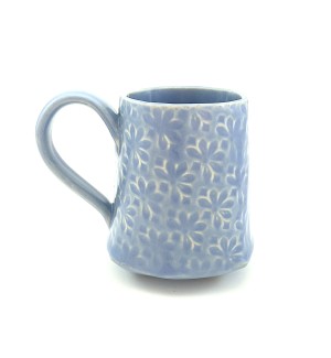 Handbuilt light blue Ceramic Mug stamped with floral pattern.