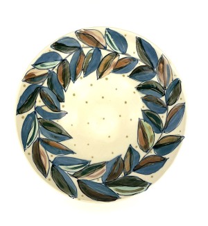 Ceramic hand painted Bowl with ring of blue and green leaf pattern and dots.