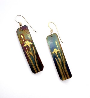 Copper rectangular dangle Earrings with a 23K Gold iris flower and bud on it.