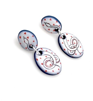 hand illustrated Ceramic two part dangle Earrings with small red hearts and a black line drawing of a snake with red details.