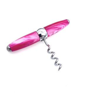 A corkscrew made of polished chrome with a cross handle pull of turned acrylic in a bright pink mottled color.