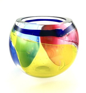 round Glass Bowl with flat top featuring yellow, blue, and red color swaths with a ring of dark blue near the top.