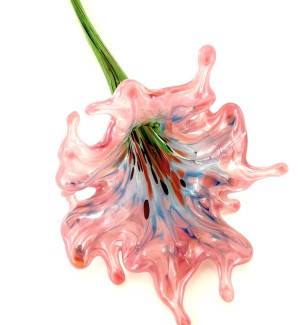 Glass flower that has a multi-colored throat and a full dusty rose colored petaled bloom with a long green stem.