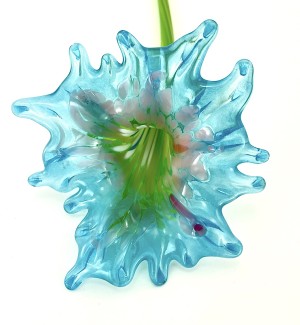 Glass flower that has a multi-colored throat and a full bright cyan colored petaled bloom with a long green stem.