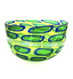 Blown glass wide bowl with a chartreuse substraight and oblong oval shapes with a bright blue outline and line green interior.