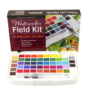 Watercolor Field Kit with palette and water brush next to packaging for watercolor field kit.