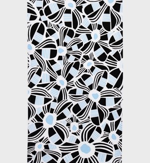 A table runner with a white background and bold black floral pattern with blue dots at the centers of the flowers.