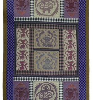 a multi colored fabric applique quilt with stylized figures that include devils, snakes, monkey monsters in plum, grey and purple tones with a bright purple and black checker board pattern around the edges.
