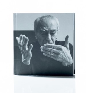 a book cover featuring a black and white portrait of Massimo Vignelli and the title 'Vignelli: Photographs by Gary Hustwit'